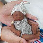 Mini_Bebe_Reborn_Negro_Kaue_Silicone_Solido_Corpo_Molinho_Sonho_Reborn