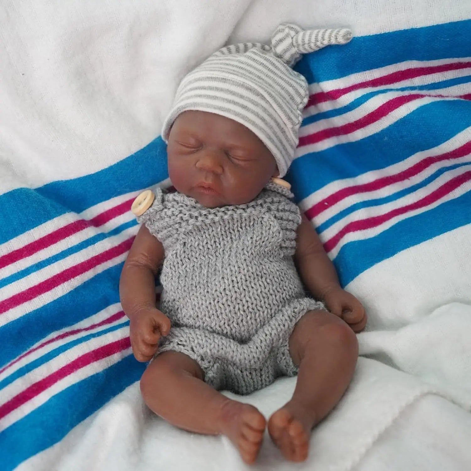 Mini_Bebe_Reborn_Negro_Kaue_Silicone_Solido_Corpo_Molinho_Sonho_Reborn